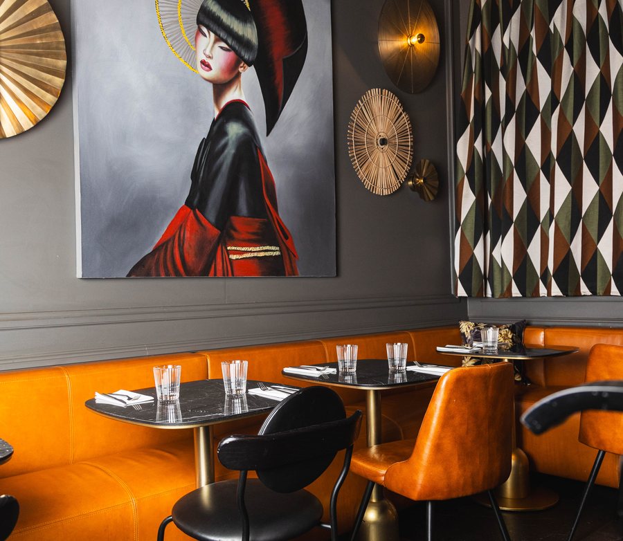 The Alcove at Les Pipelettes du Boulevard, its painting and orange banquettes